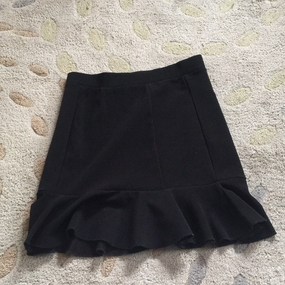 Black bodycon skirt with flounce